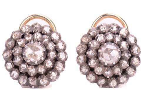Lot 254 - A pair of diamond cluster earrings, the...
