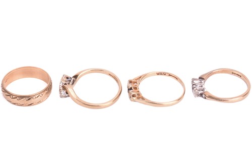Lot 18 - A collection of four rings; comprising a...
