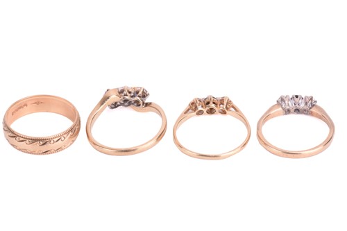 Lot 18 - A collection of four rings; comprising a...