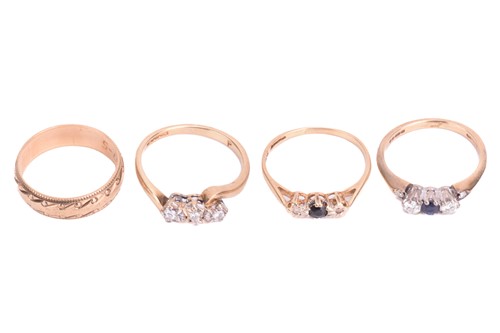 Lot 18 - A collection of four rings; comprising a...