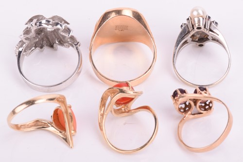 Lot 10 - A collection of six rings, including pearl set...