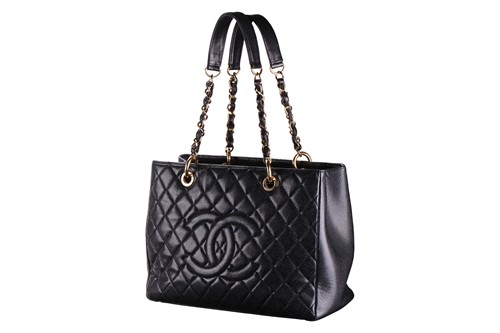 Lot 266 - Chanel - a Grand Shopping Tote in black...