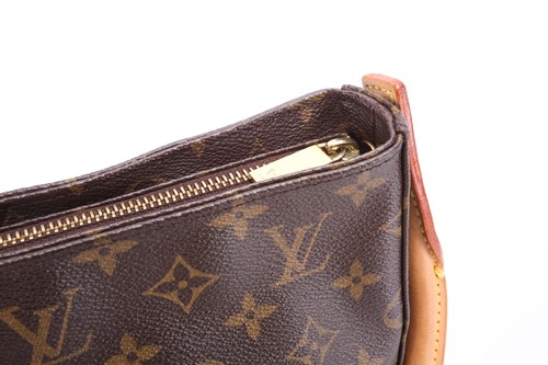 Lot 311 - Louis Vuitton - a Looping MM shoulder bag in...