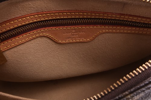 Lot 311 - Louis Vuitton - a Looping MM shoulder bag in...