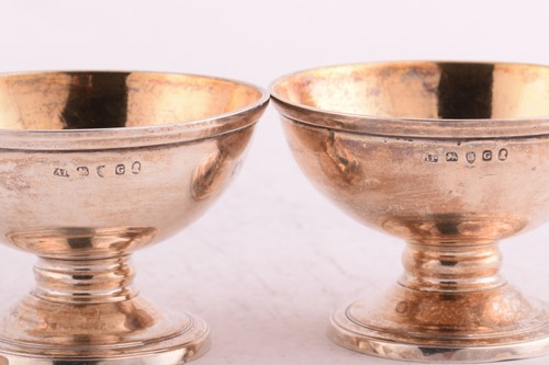 Lot 430 - A set of six George III silver salts by...