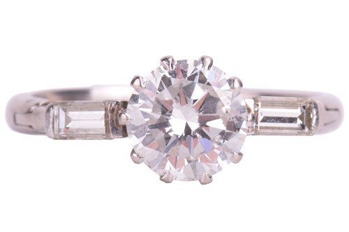 Lot 191 - A Diamond set three-stone ring, featuring a...