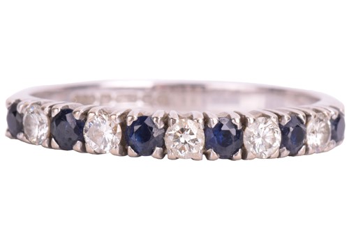Lot 224 - An 18ct white gold sapphire and diamond ring....