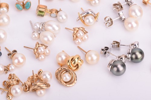 Lot 12 - A collection of mostly pearl earrings,...
