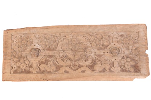 Lot 127 - An early 17th-century carved oak frieze panel...