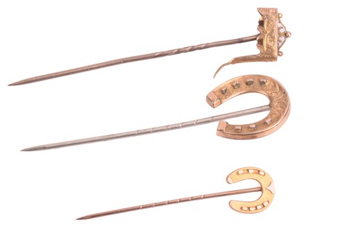Lot 226 - A collection of three stick pins, a brooch and...