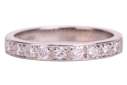 Lot 213 - A half-hoop diamond ring in 18ct white gold,...