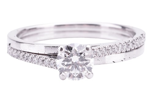 Lot 109 - A diamond single-stone ring, by De Beers. The...