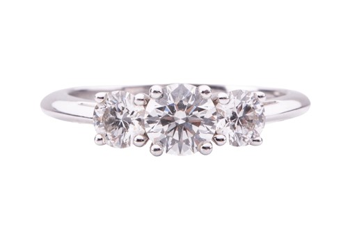 Lot 147 - Tiffany & Co. - a diamond trilogy ring,...