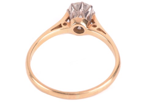 Lot 20 - A single stone diamond ring; the round...