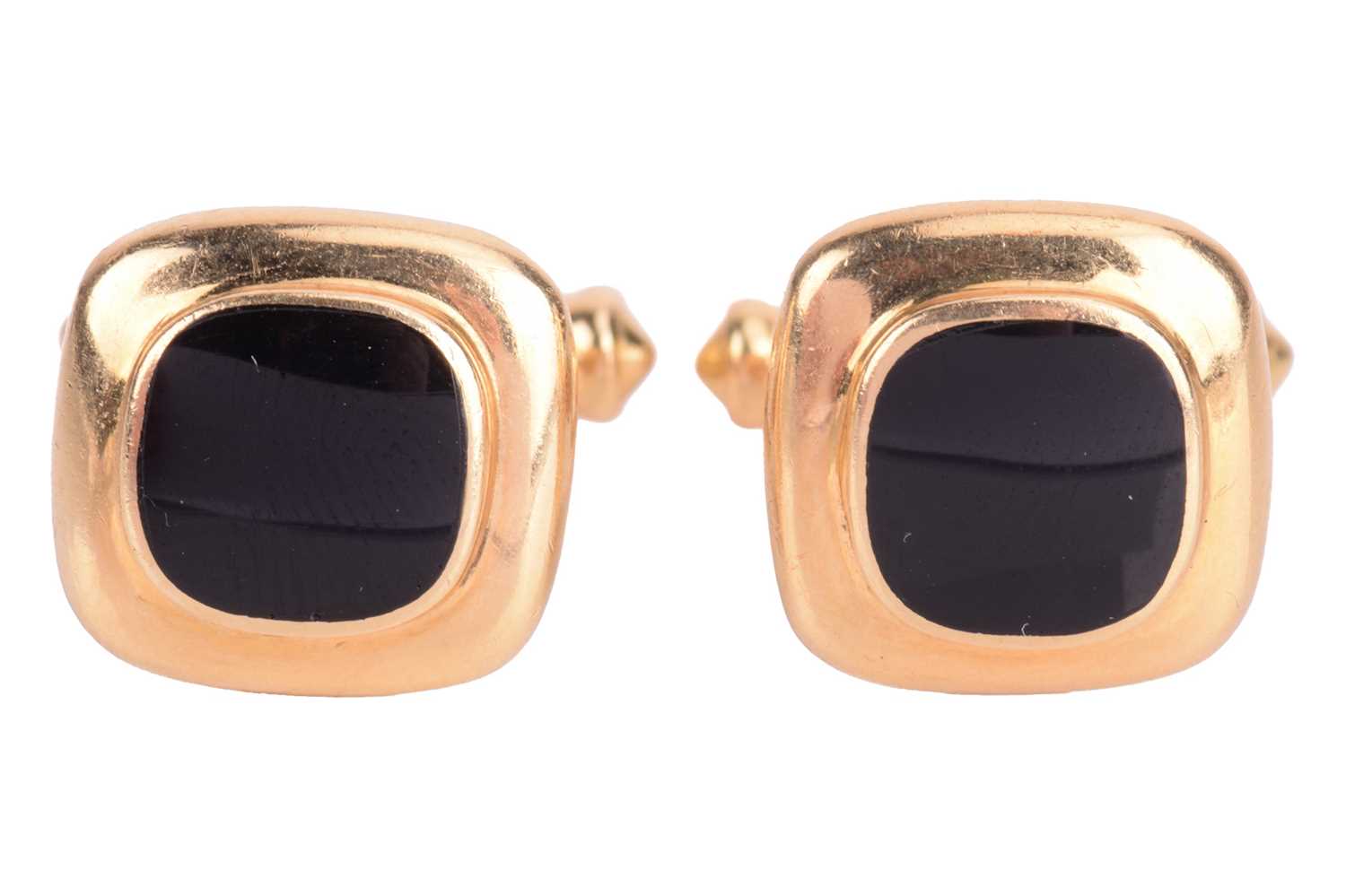 Lot 30 - A pair of onyx cufflinks in 18ct yellow gold,...