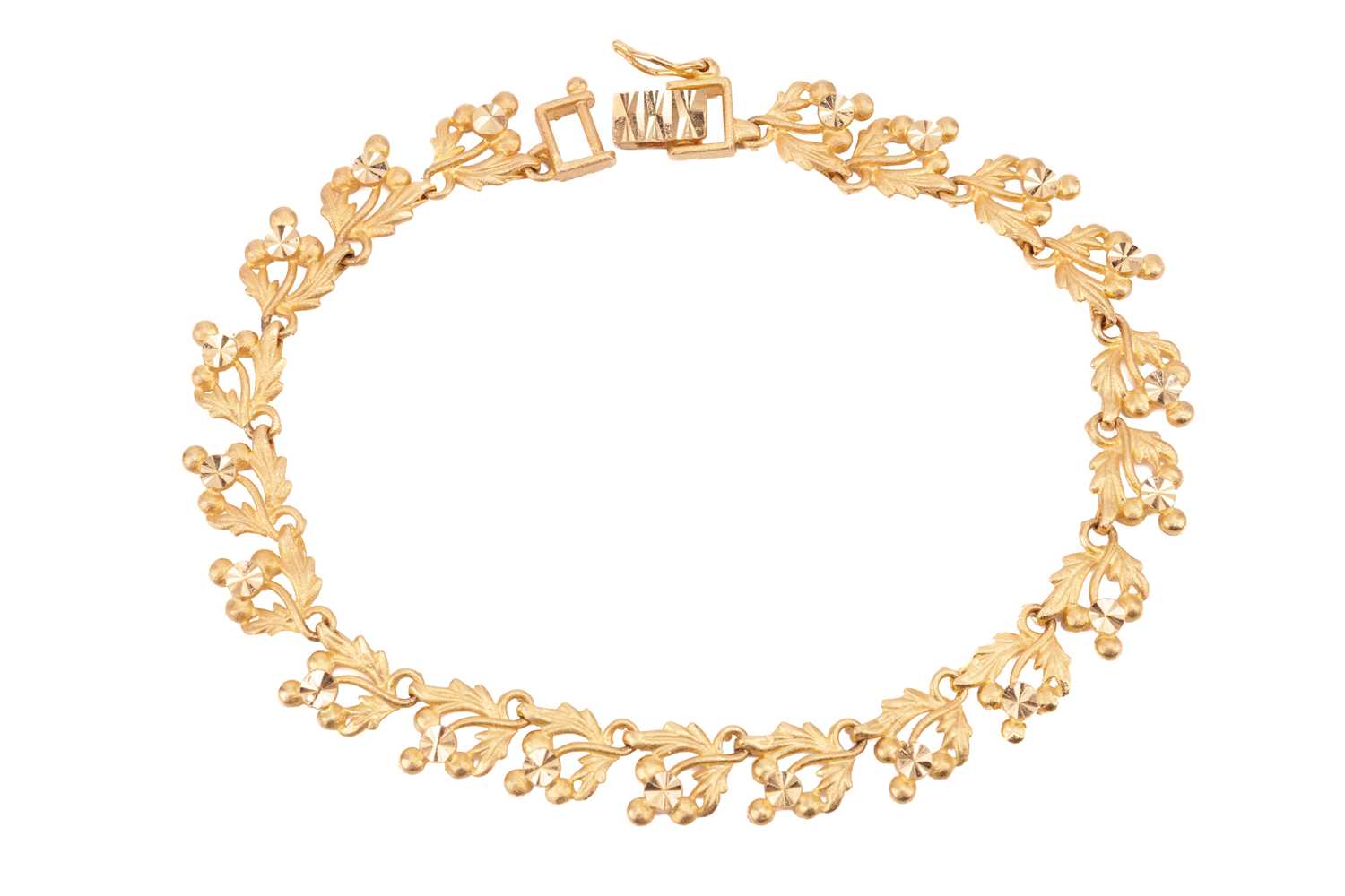 Lot 49 - A fancy link bracelet, each link with a...