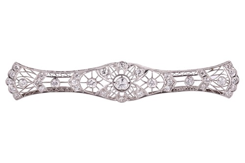 Lot 8 - A diamond-set filigree bar brooch featuring...