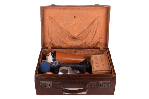 Lot 308 - A vintage brown leather travelling case,...