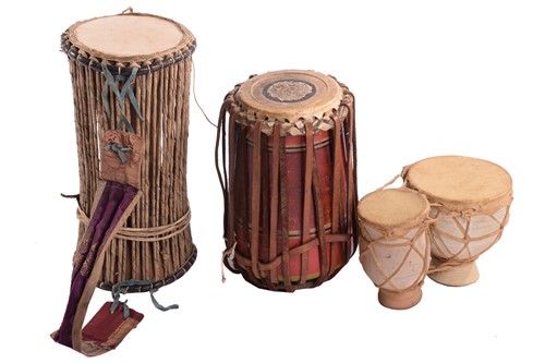 Lot 317 - A group of eight assorted hand-drums, from the...