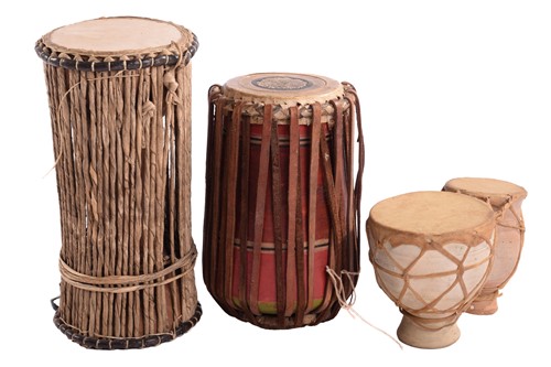 Lot 317 - A group of eight assorted hand-drums, from the...