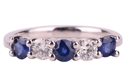 Lot 64 - A sapphire and diamond five-stone ring in 18ct...