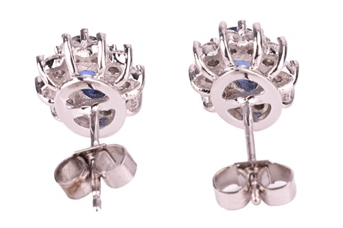 Lot 44 - A pair of sapphire and diamond cluster stud...