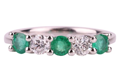 Lot 33 - An emerald and diamond five-stone ring,...
