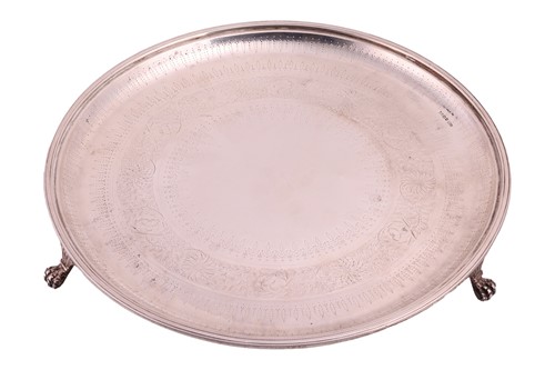 Lot 203 - A silver salver of circular form with a reeded...