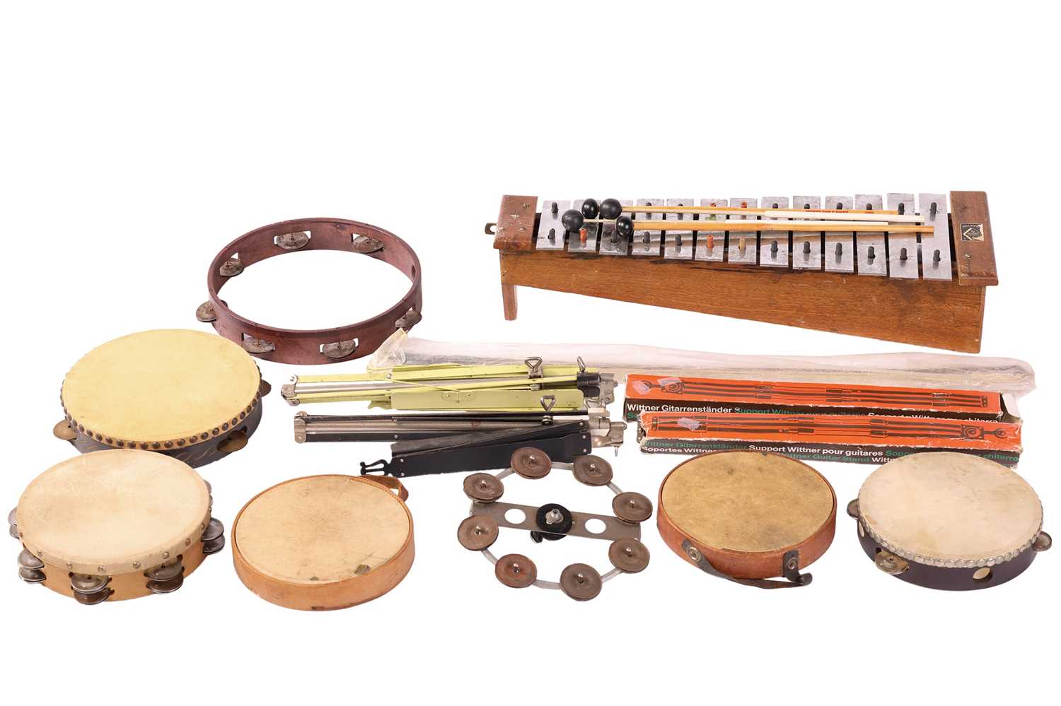 Lot 320 - A collection of percussion instruments from
