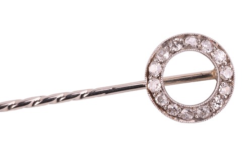 Lot 7 - A diamond-set open circle stick pin, the...