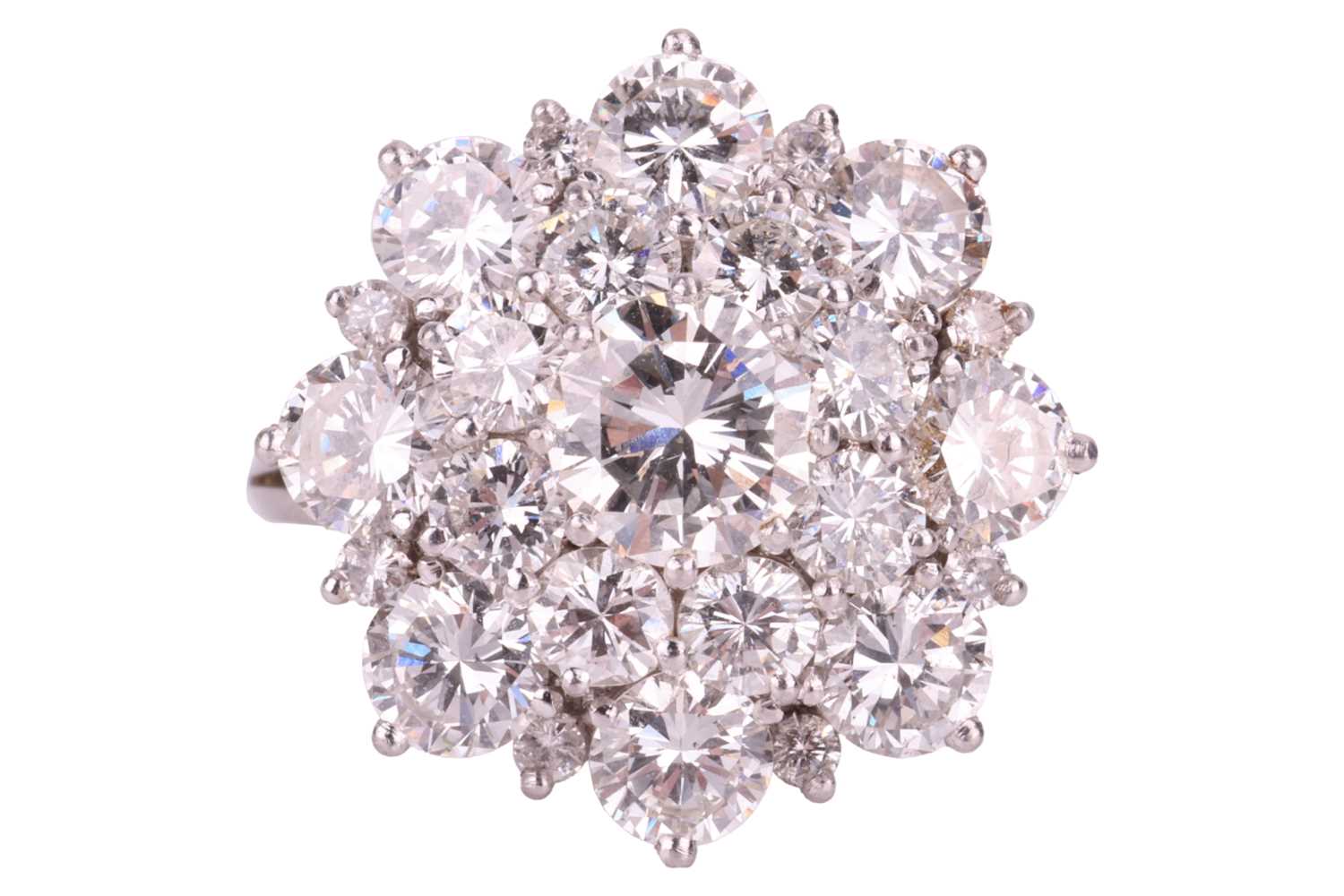 Lot 95 - A diamond cluster ring, set with round...