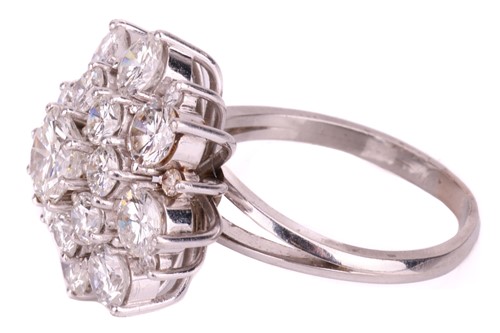 Lot 95 - A diamond cluster ring, set with round...