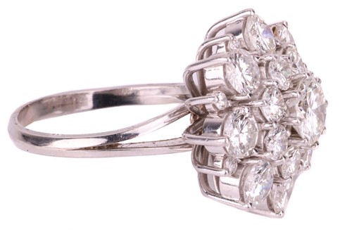 Lot 95 - A diamond cluster ring, set with round...