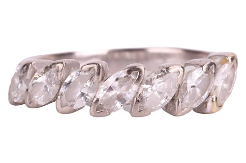 Lot 92 - A diamond set seven-stone ring, featuring...