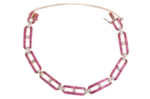 Lot 16 - A ruby and diamond bar link bracelet,...
