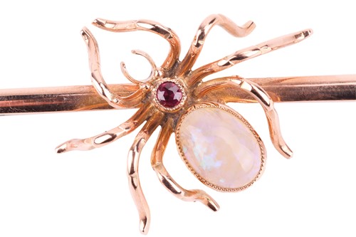Lot 22 - A gem set spider bar brooch, the body of the...