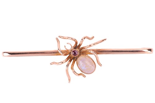Lot 22 - A gem set spider bar brooch, the body of the...