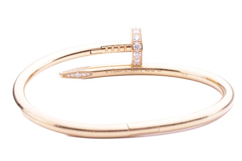 Lot 100 - Cartier - a 'Juste un Clou' diamond-set...