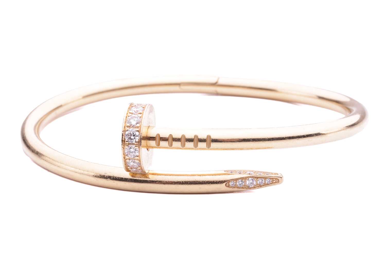 Lot 100 - Cartier - a 'Juste un Clou' diamond-set...