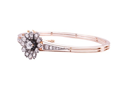 Lot 1 - A Victorian floral diamond-set bangle/pendant,...