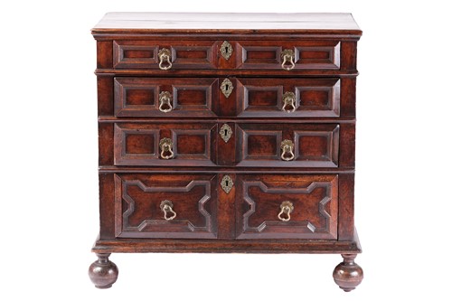 Lot 175 - A late 17th-century walnut chest of four long...