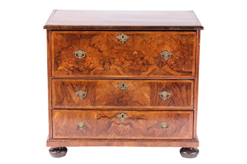 Lot 200 - A William & Mary walnut chest of three long...