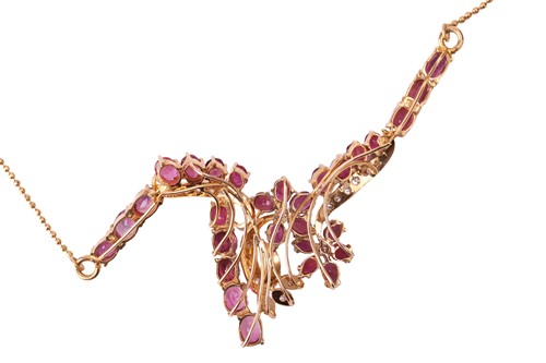 Lot 94 - A ruby and diamond necklace, the centre set...