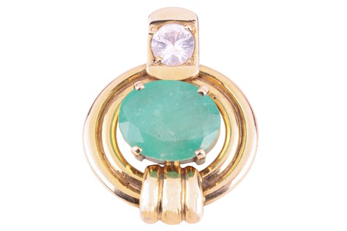 Lot 14 - An emerald and white sapphire pendant, set...