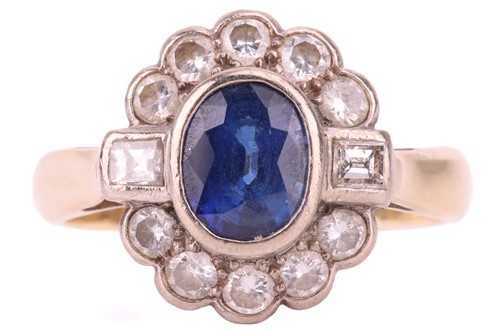 Lot 90 - A sapphire and diamond halo ring, centred with...
