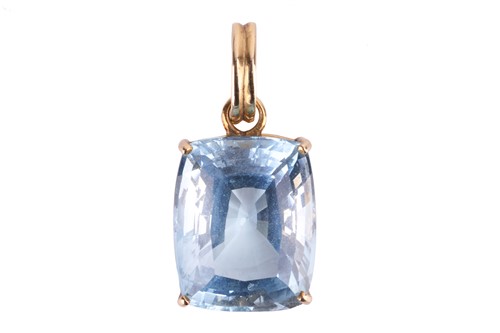 Lot 65 - A single stone aquamarine pendant; the cushion-...