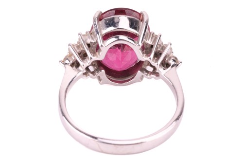 Lot 18 - A rubellite and diamond ring, the oval...