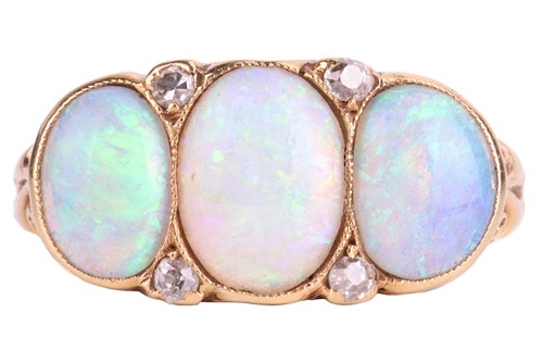 Lot 130 - An opal and diamond-set three stone ring, the...