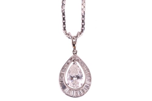 Lot 92 - A diamond cluster pendant featuring a pear cut...