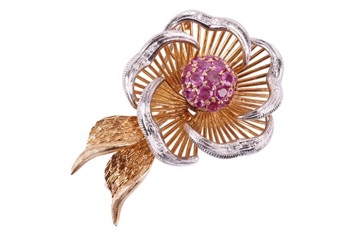 Lot 189 - A ruby and diamond flower brooch, featuring a...